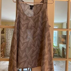Like New Torrid Grey
Feather Chiffon
Shark-bite Tank Size
0 (12/L)